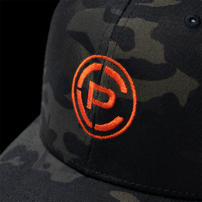 CP Logo Trucker Hat MultiCam Black/ Orange Close-up