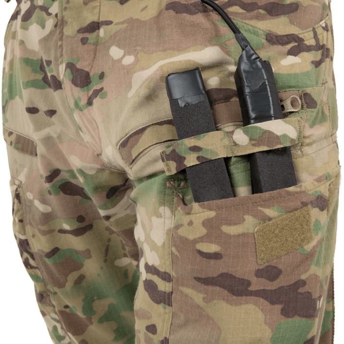 Cargo pocket pass-throughs for door charges
