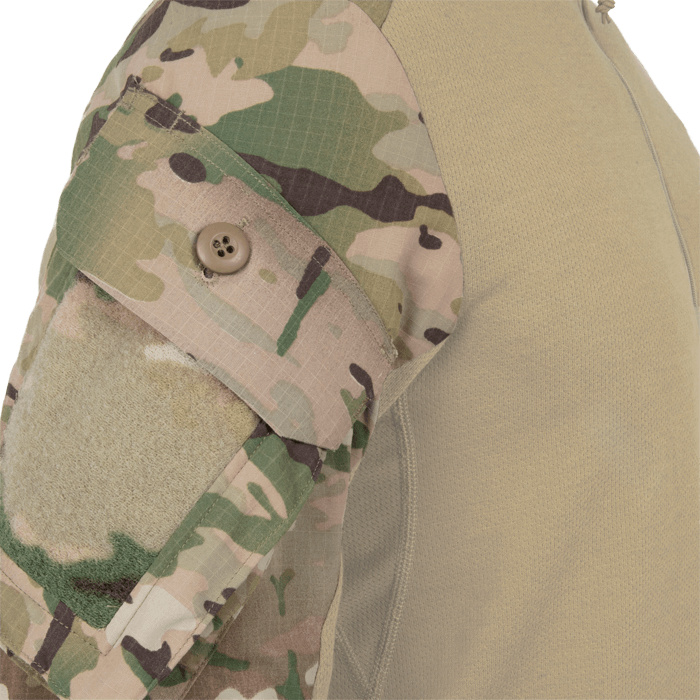 Shoulder pocket with button closure and thermo-bonded flap