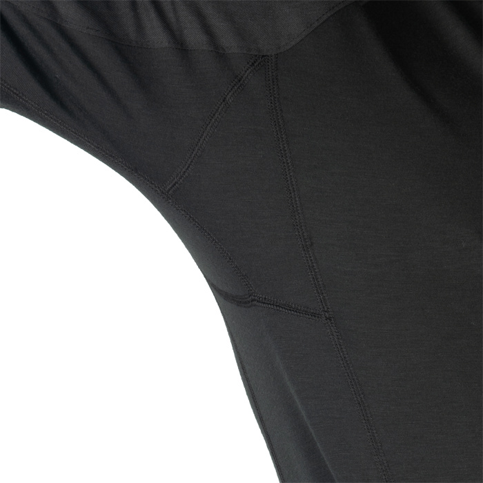 Underarm panels shaped for enhanced mobility