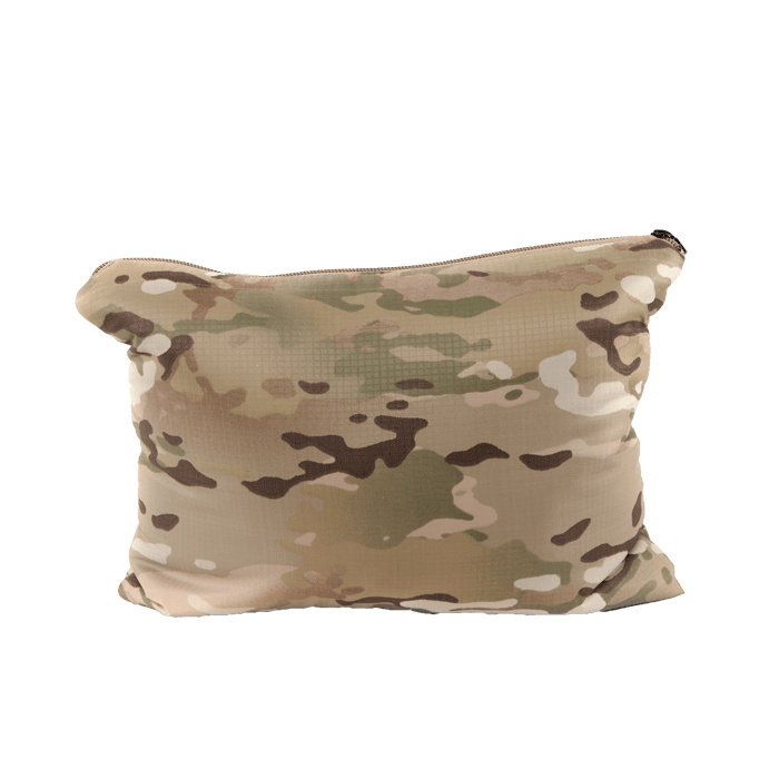 Packs into itself for use as pillow