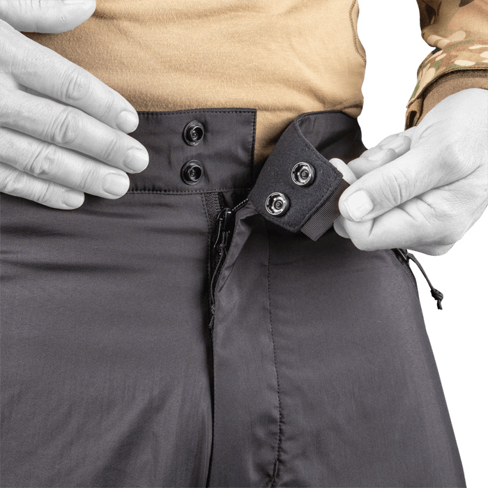 Snap waistband with glove compatible tab