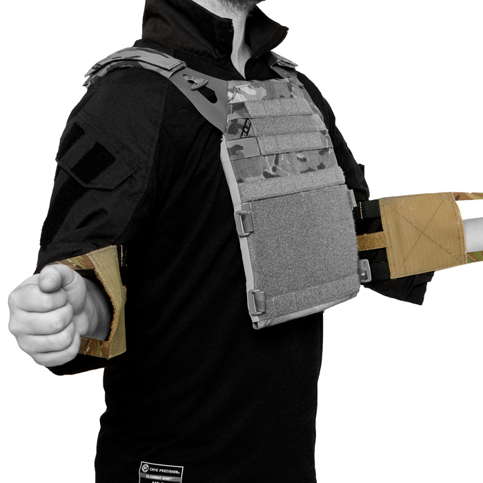 Low-profile cummerbund attachment that provides maximum adjustability and allows for chest expansion as needed